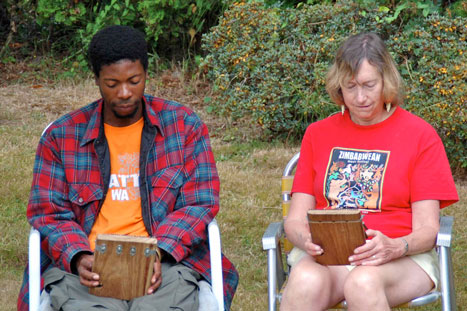 Simboti teaching Nancy mbira